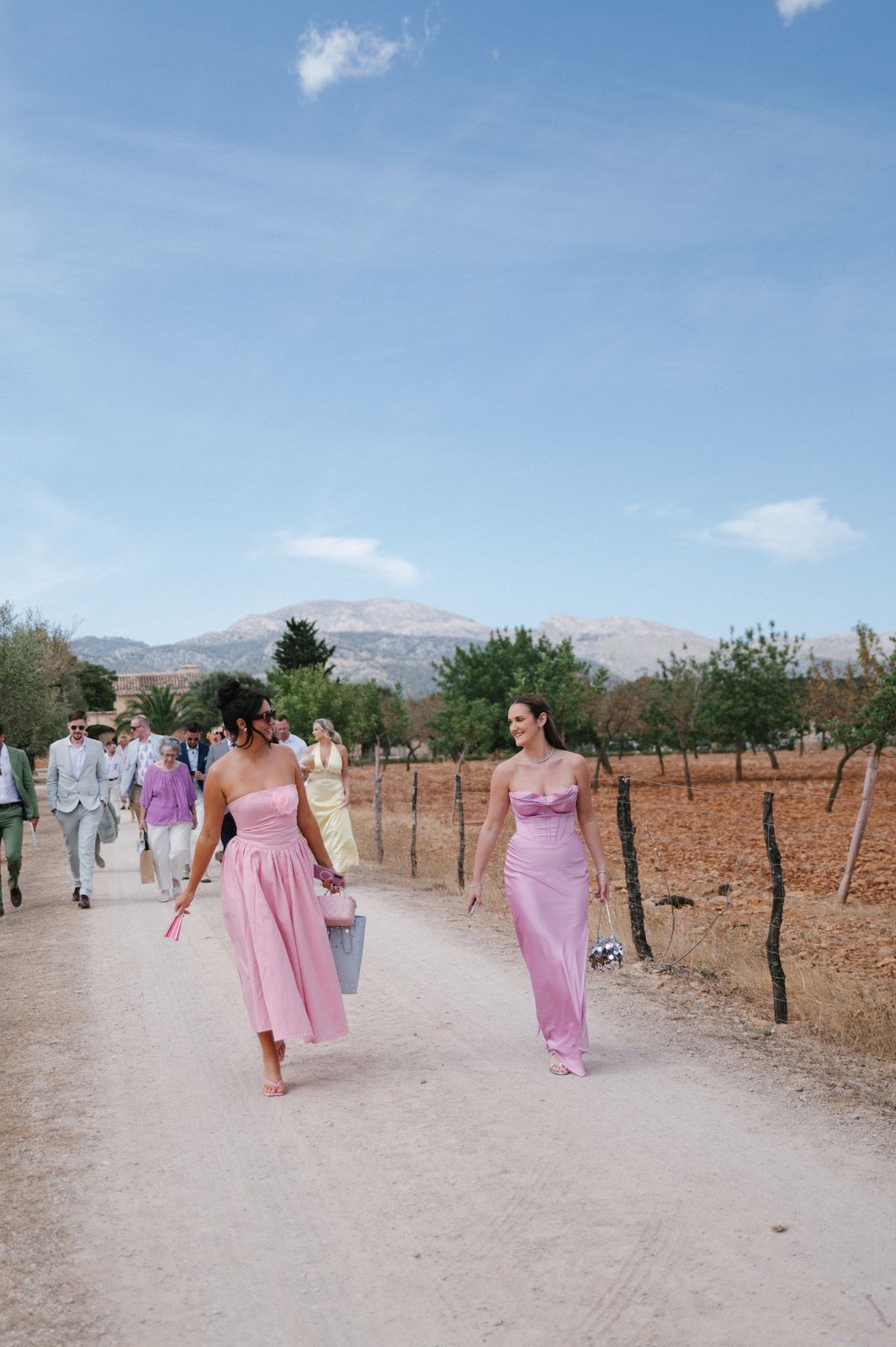 Woodland wedding ceremony under the old trees at Finca Binissatí, Mallorca