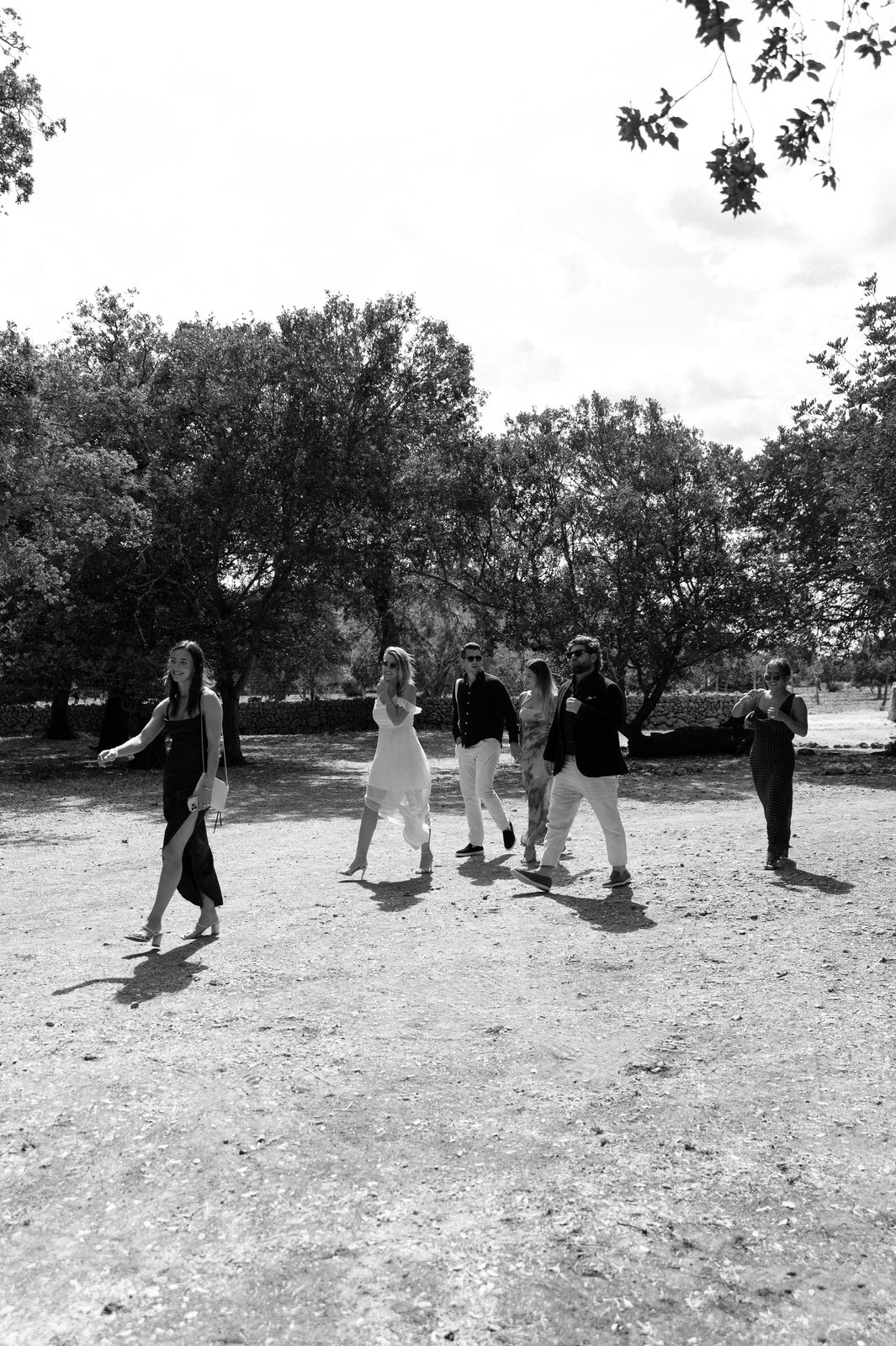 Woodland wedding ceremony under the old trees at Finca Binissatí, Mallorca