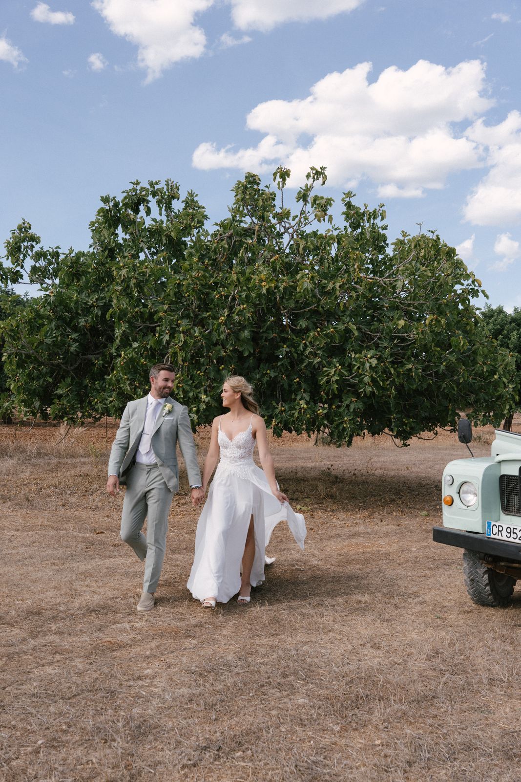 Woodland wedding ceremony under the old trees at Finca Binissatí, Mallorca