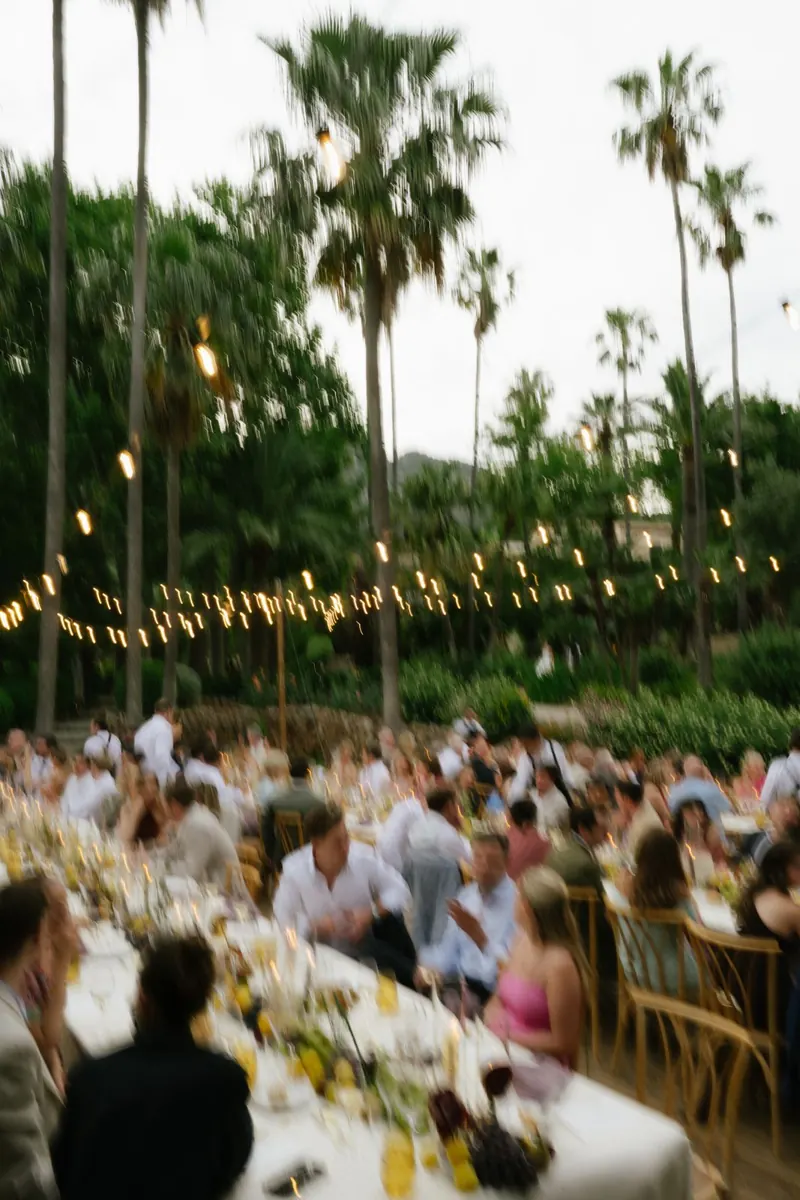 Long tables dressed with figs and peaches at Jardines de Alfabia, Mallorca