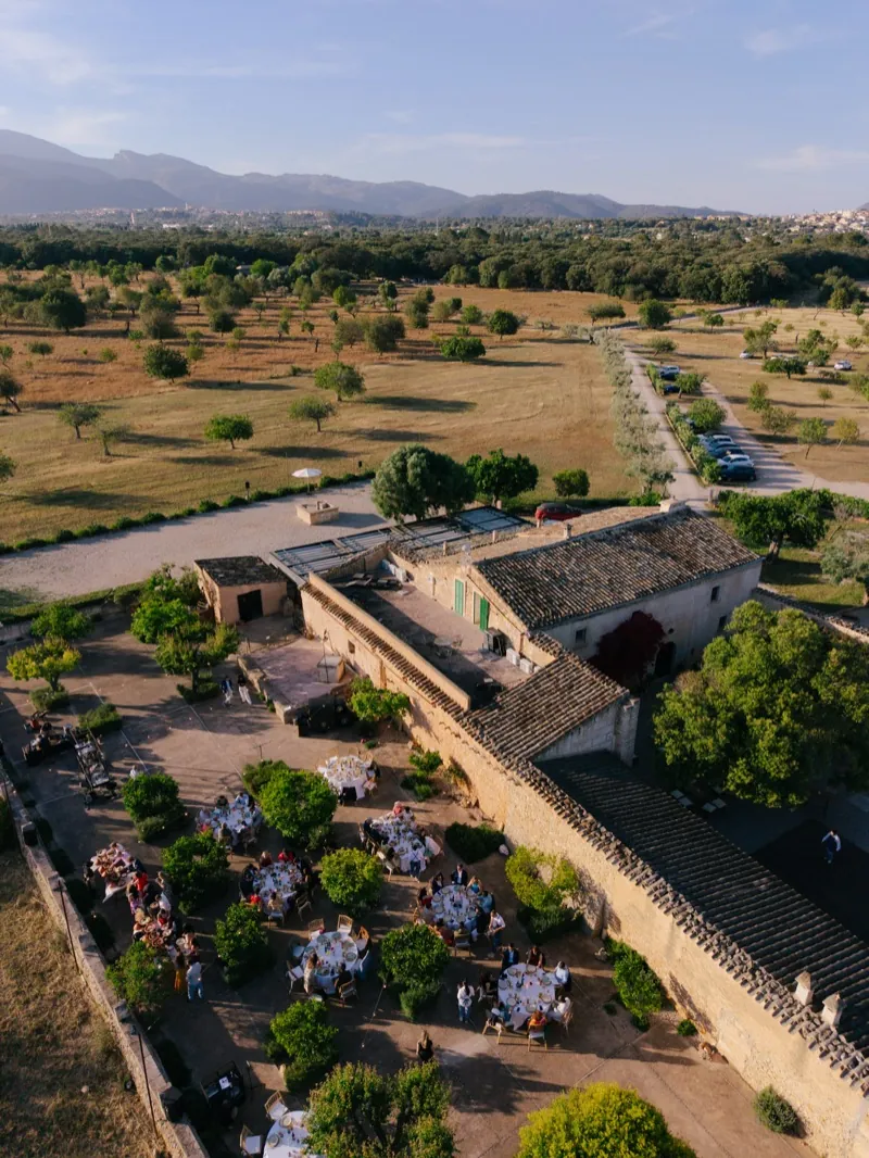 The finca from the air, the tables set in the courtyard, Finca Binissatí, Mallorca