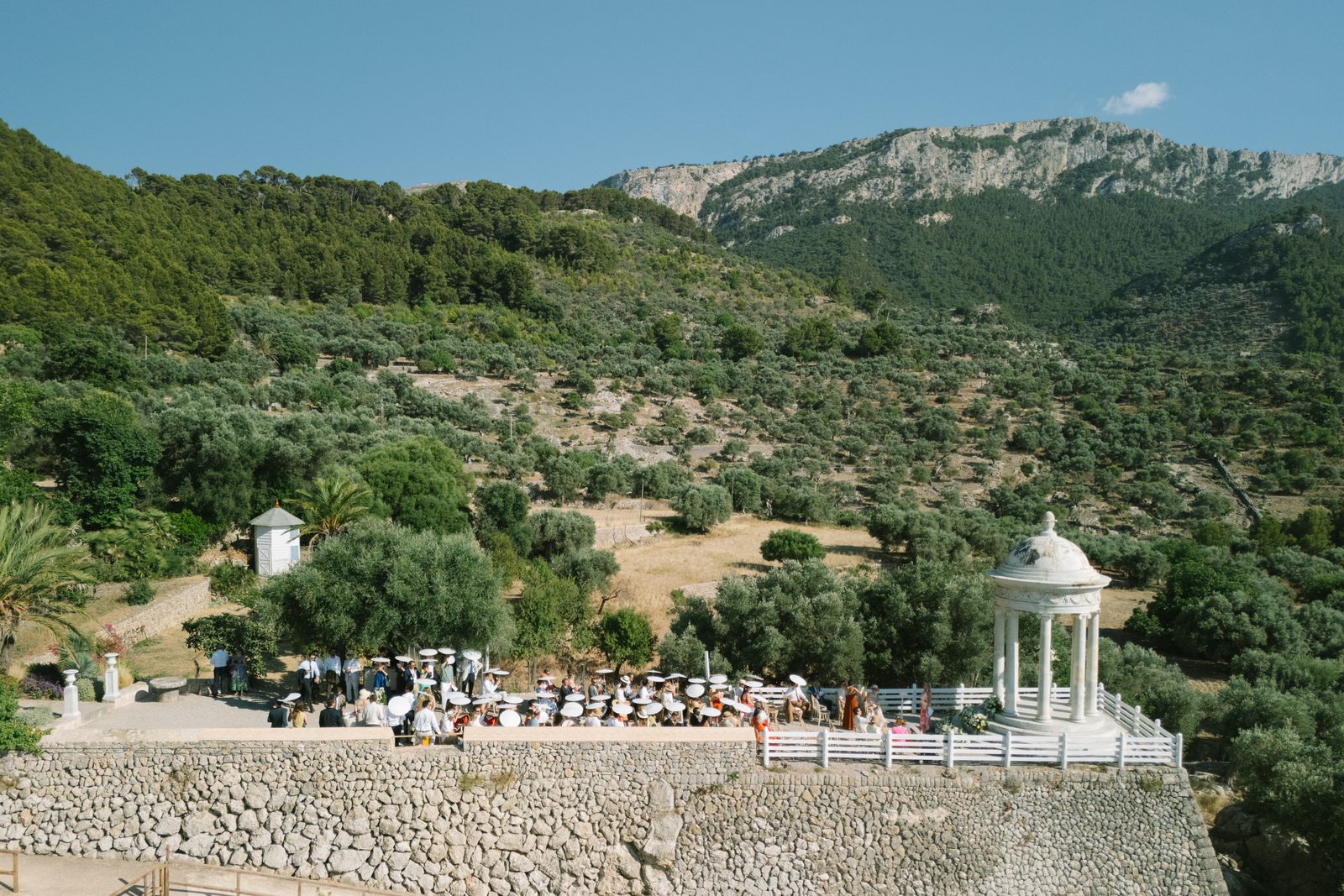 Family-led wedding ceremony at the Son Marroig rotunda, Deià, Mallorca
