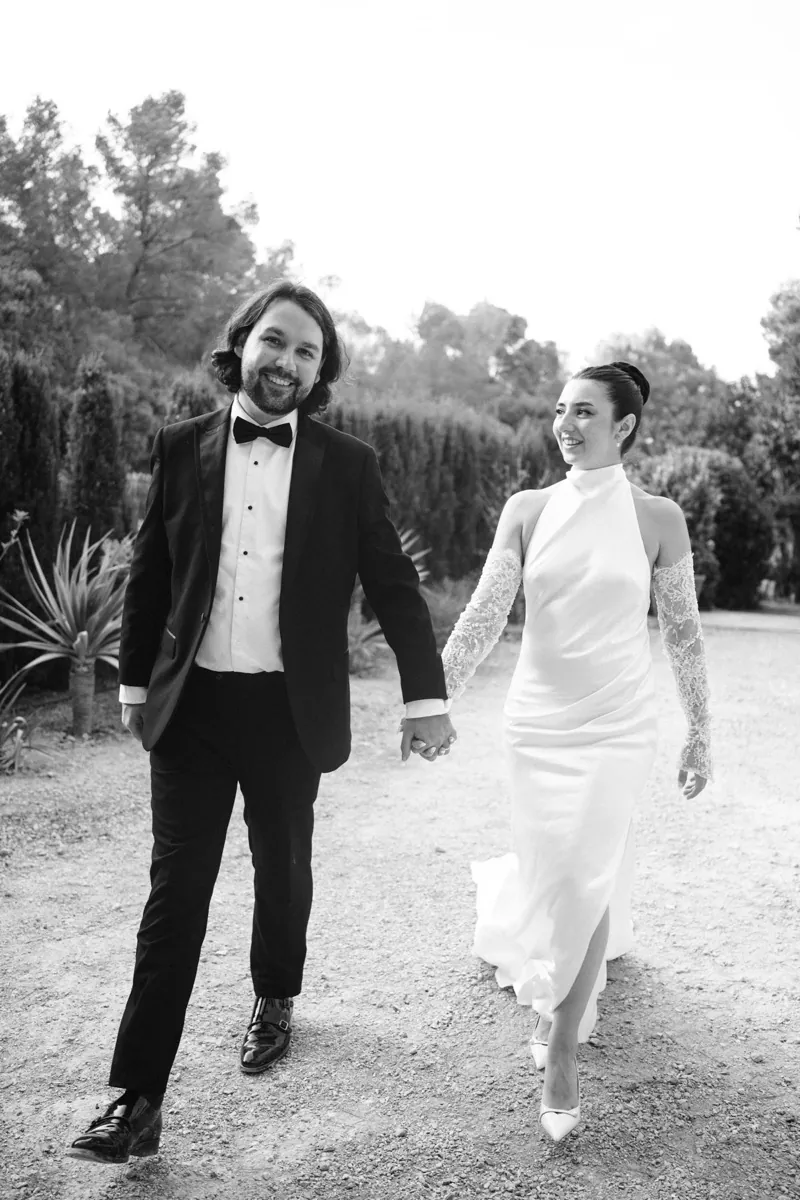The couple walking hand in hand after the ceremony, Lume & Co, Génova, Mallorca