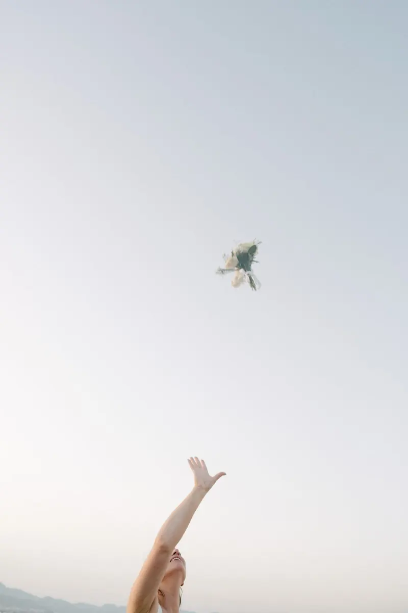 Cake, confetti and dancing on the deck of Falcao Uno at sunset, Mallorca