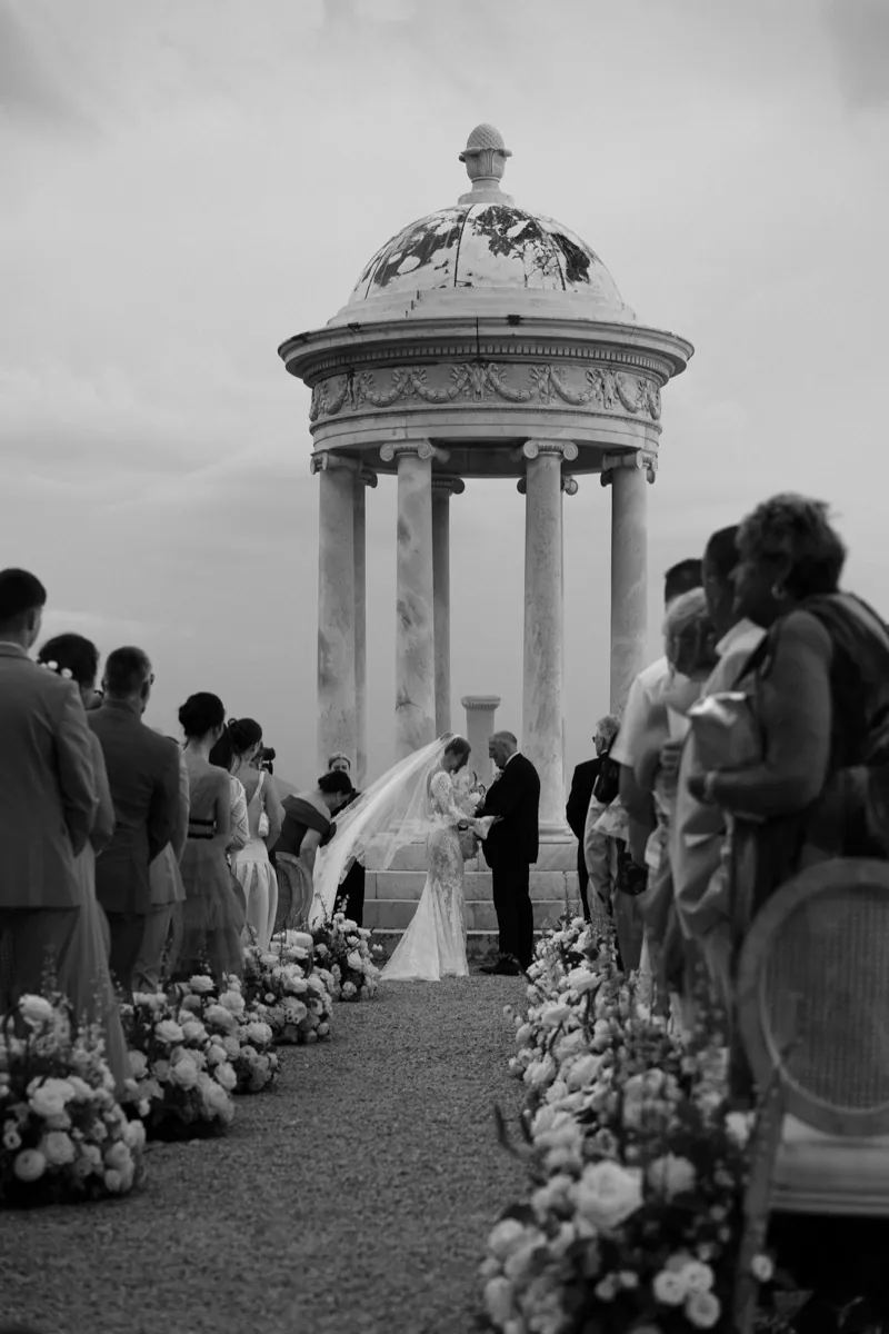 Ceremony at the marble rotunda, the aisle lined with flowers, Son Marroig, Deià, Mallorca