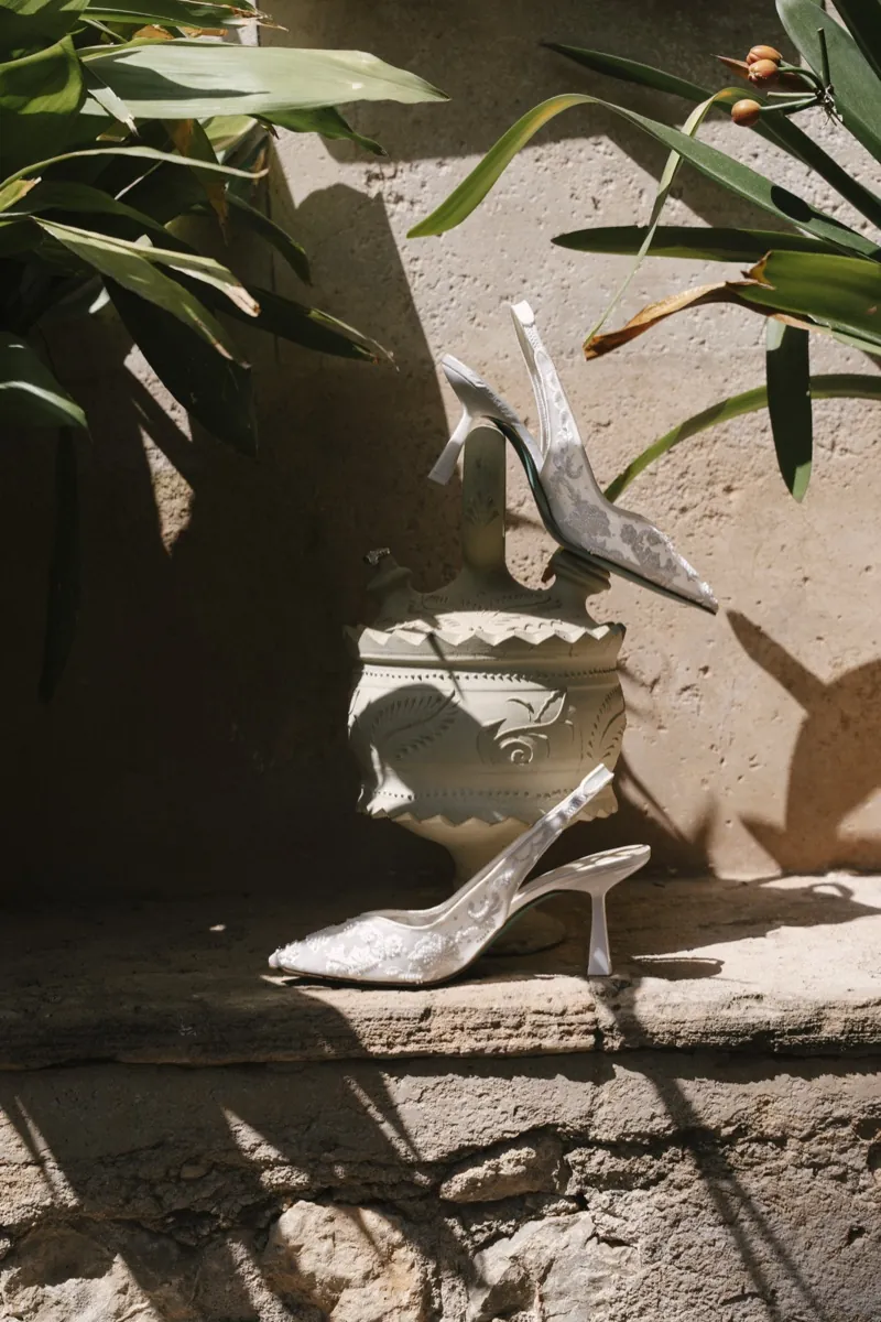 The bride’s shoes on a stone ledge in hard sunlight, Son Termes, Mallorca